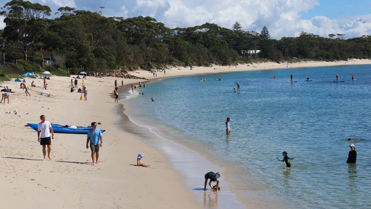 Beach goers lap up the Autumn sun at Shoal Bay beach last week. Picture by Laura Rumbel