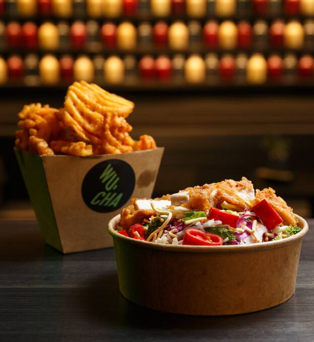 On the menu: Waffle cut fries, Asian raw salad with chicken fillet.
