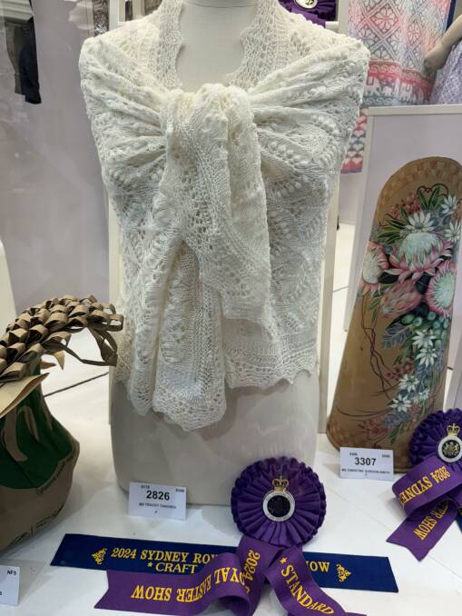 The first prize ribbon for Tracey Tancred's handcrafted shawl at the 2024 Sydney Royal Easter Show.