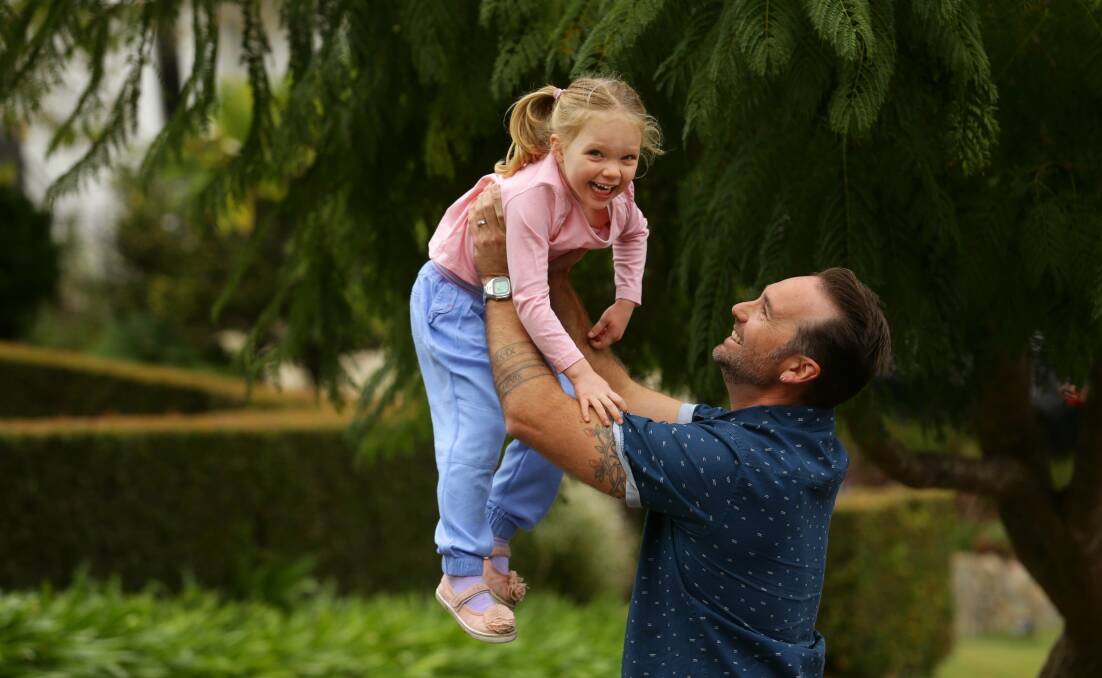 Helping Hand: Tim Harding and his daughter Arielle, who has epilepsy. Mr Harding believes medicinal cannabis could help treat her condition. Picture: Jonathan Carroll.   