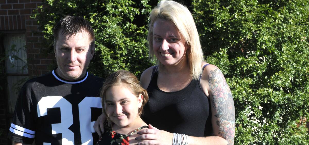 LIFE SAVING: The Bushell family Adam, Bec and Tahlia at their home in Singleton Heights.