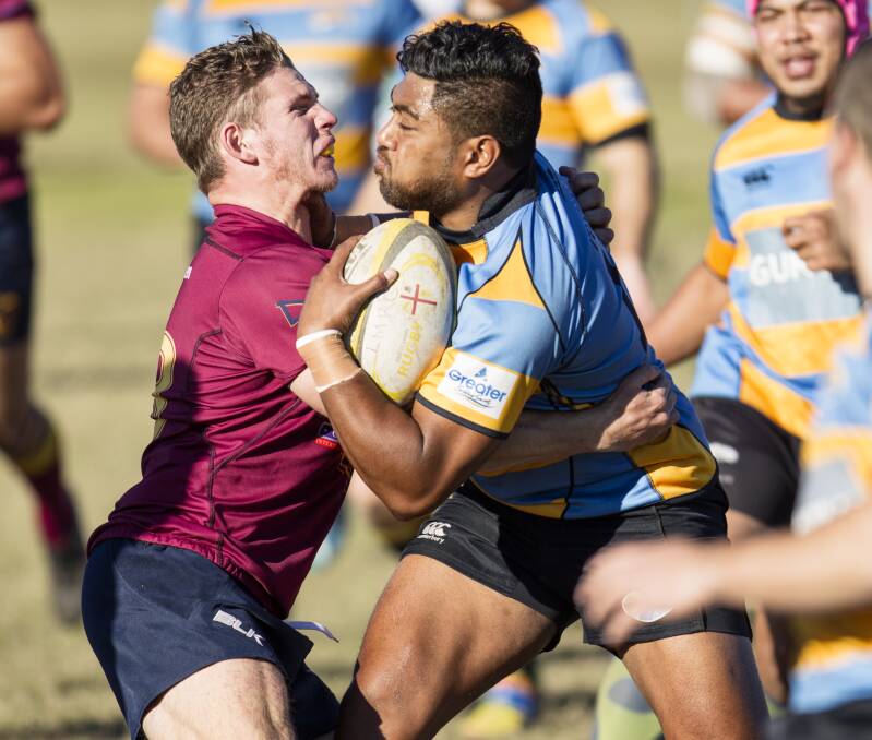 CRUNCH: Southern Beaches flyer James Vaka is met by Lake Macquarie outside centre Caileb Gerrard at Walters Park on Saturday. Picture: Stewart Hazell 