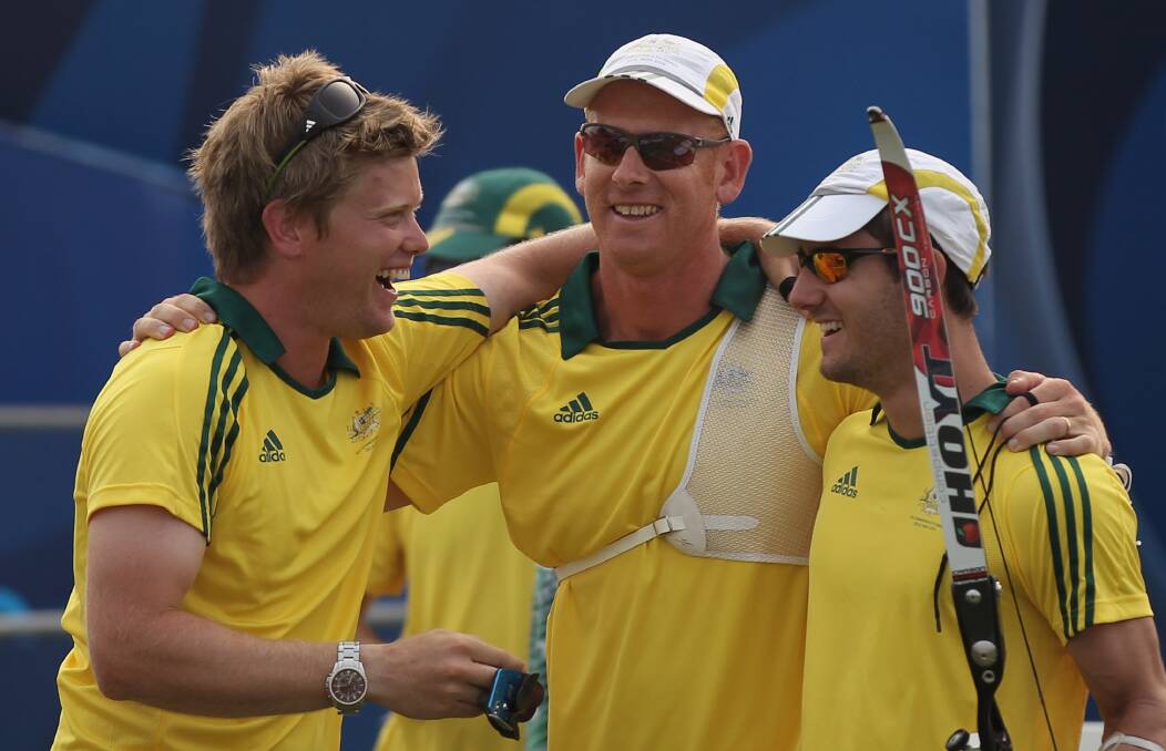 PAST GLORY: Mat Masonwells, Matthew Gray and Taylor Worth after winning teams gold for Australia at the 2010 Commonwealth Games. Worth beat Gray for the discretionary place on Australia's team for the Rio Olympics. Picture: Getty Images
