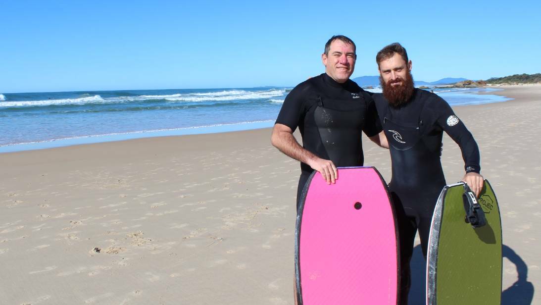 Mates: Shark attack survivor Dale Carr and his mate Shane Roche who rescued him from the water at Lighthouse Beach. Shane has been nominated for a Pride of Australia Award. Photo: TRACEY FAIRHURST
