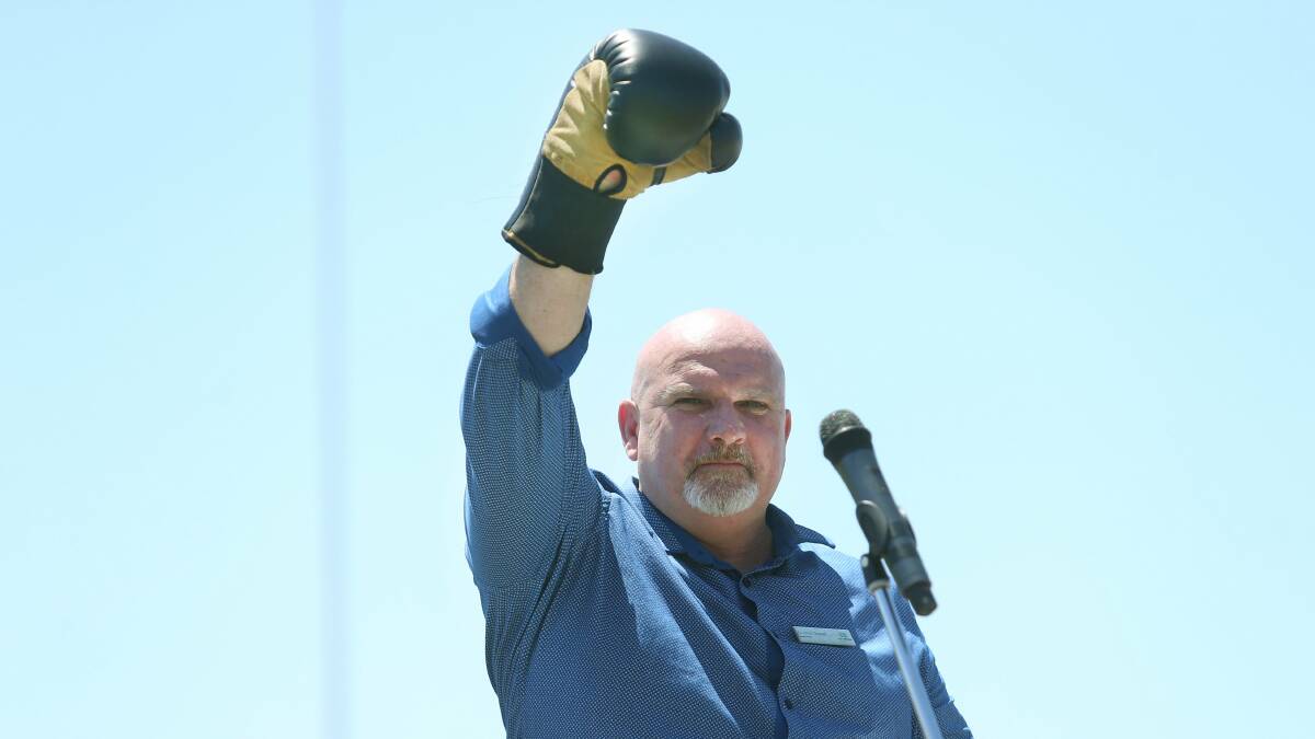 READY FOR THE FIGHT: Cr Chris Doohan at the anti-merger rally at Raymond Terrace last year.