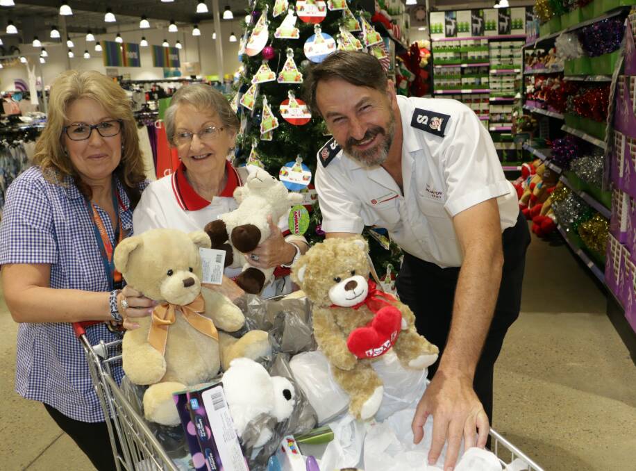 APPEAL: Sue Smith, Gloria Ferguson and Howard Koutnik from the Salvation Army pictured at Salamander Bay Kmart Wishing Tree.