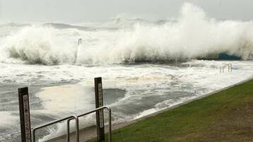 SWELL:  Tim Cusack took these photos of the Forster Ocean Baths during the storm surge on Sunday 5 June