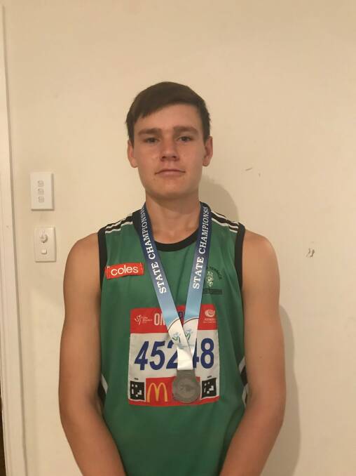 ON TARGET: Jack Kenny  with his silver medal for U17 State javelin.