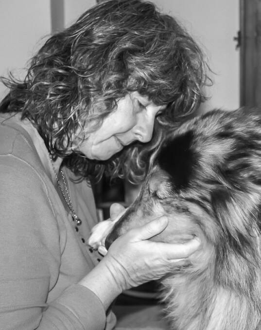 LIFELONG BATTLE: Medowie resident Nicole Skinner and her best friend and carer Kai the collie rough. Picture: supplied