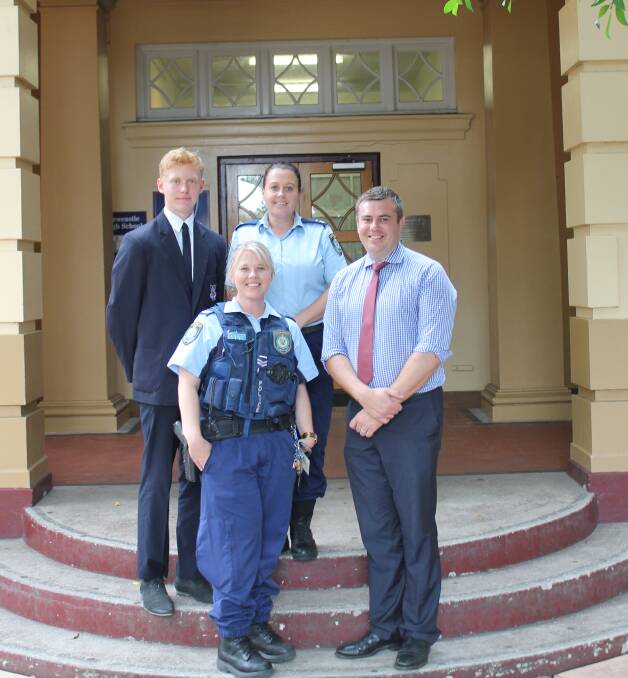 UNITED:  Newcastle High captain Zack Aislabie, 17, with police officers Bronwyn Leary (front), Leanne Mann and principal Nathan Towney.