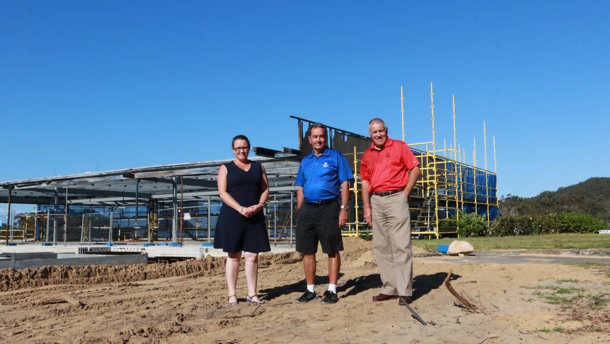 REBUILD: Nelson Bay Golf Club's Natalie Kelly, Peter Power and Max Pride in front of the new clubhouse expected to be completed in June 2017. 