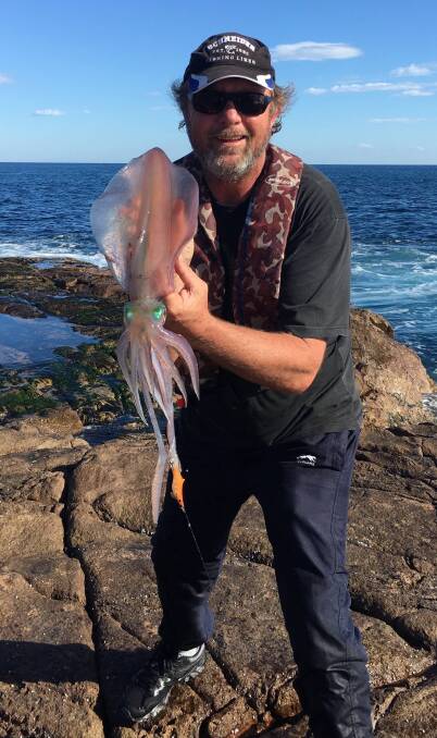 Good catch: Terry Hunt with his mighty Fishermans Bay squid.