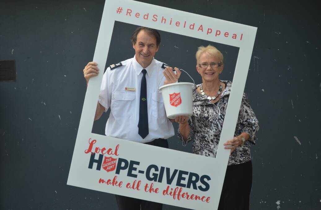JOIN THE CAUSE: Salvation Army Tomaree Peninsula envoy Howard Koutnik and Red Shield Appeal chairwoman Cr Sally Dover. Picture: Sam Norris