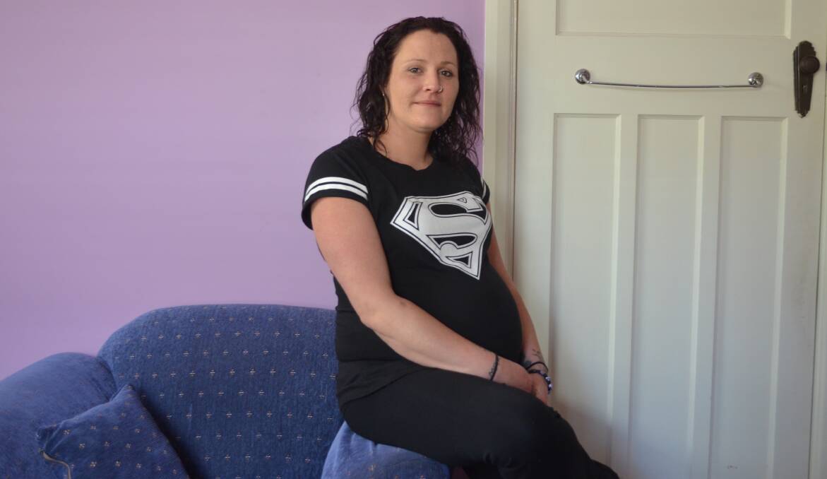 SURVIVOR: Erika Petersen, 32, was living in a tent just four weeks ago. She's due in two weeks. Picture: Sam Norris
