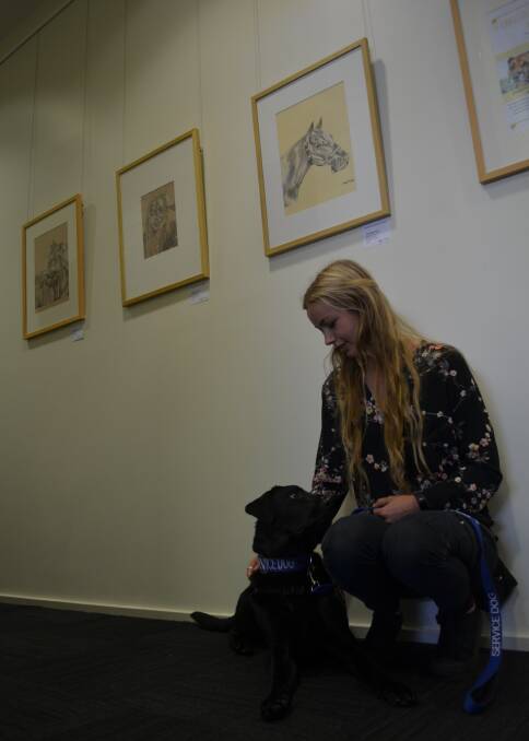 BOND: Ashleigh Price with her assistance dog Lexie. Picture: Sam Norris