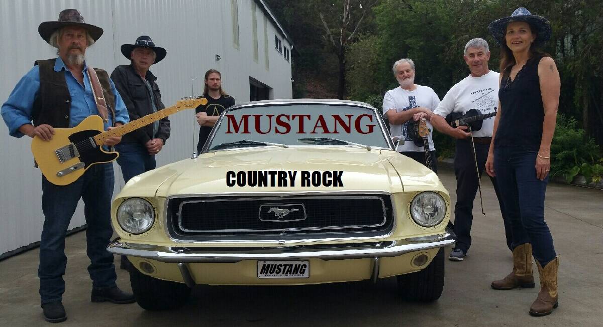 COUNTRY BEAT: Mustang are  Rob Godwin (lead guitar), Grahame Griffin (bass), Rick Rhodes (drums), Terry Helliker (keys) and Dick Ayre (fiddle) and Trish Hart (vocals).