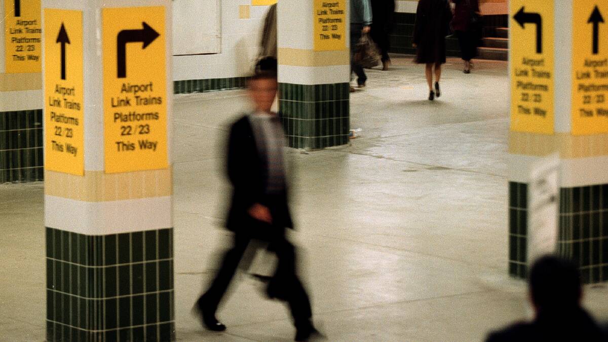 WHICH WAY: Port Stephens councillor Steve Tucker wants to lock down the route for rail to Newcastle Airport in the next term of council. Above, signs point every which way to the airport train at Sydney's Central Station, in 2000.