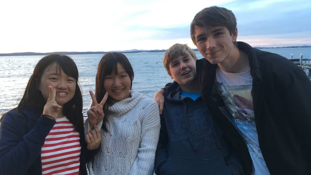 HAPPY EXCHANGE: Japanese exchange students Yukiji and Amane, both 14, were hosted by the Deverell family, Nelson Bay. They are pictured here with brothers Dalton, 14 and Finn, 16.