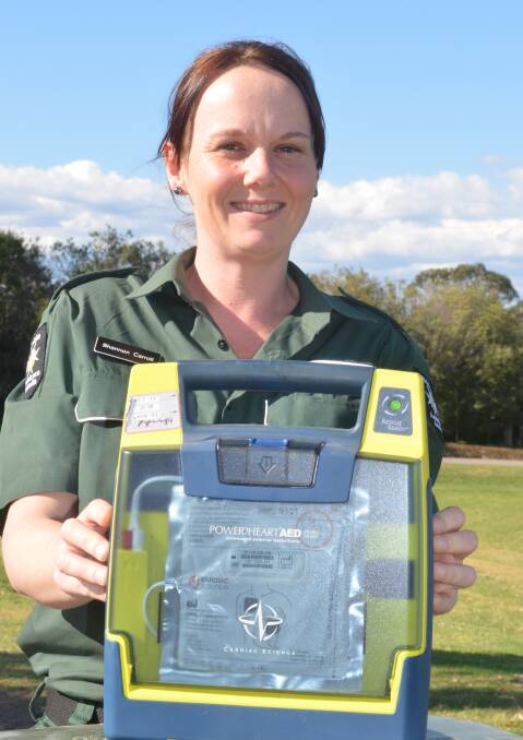 WORTH IT: St John Ambulance Service Maitland-division volunteer Shannon Carroll with a life saving Automatic External Defibrillator. Picture: Sam Norris 
