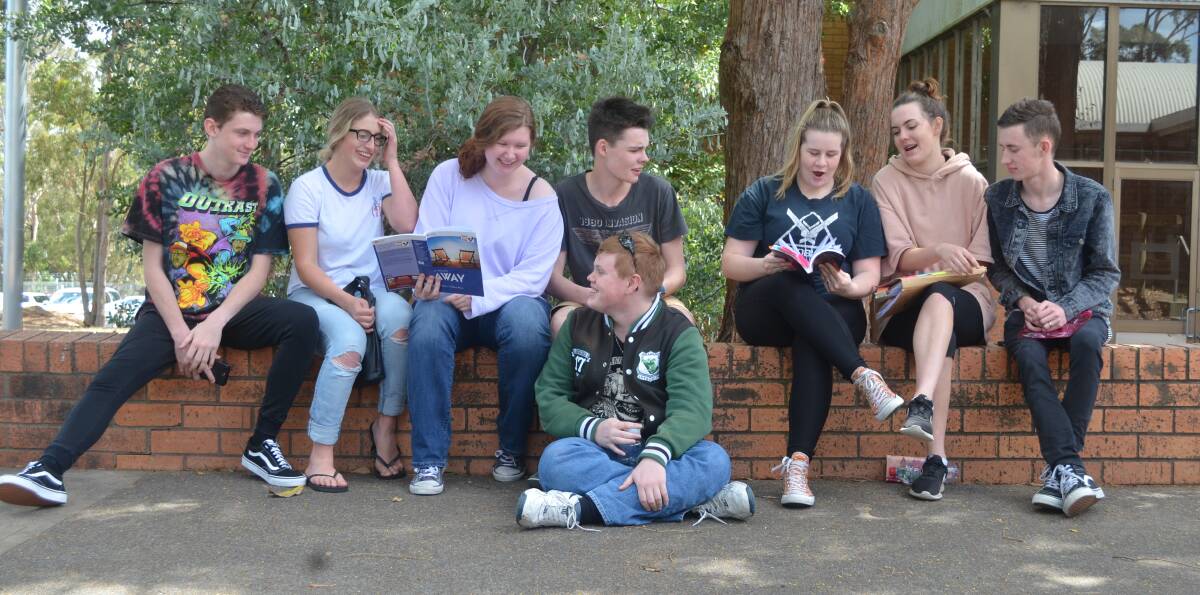 ONE DOWN: Year 12 students from Irrawang High School after their English exam. Grant Soper, 18, Brittney Edwards, 17, Victoria Herbert, 18, Josh McFarland, 18, Beau Olliffe, 17, Monique D'Arcy, 18, Dylan Hopper, 17, and Lincoln Hunter, 18. Picture: Sam Norris