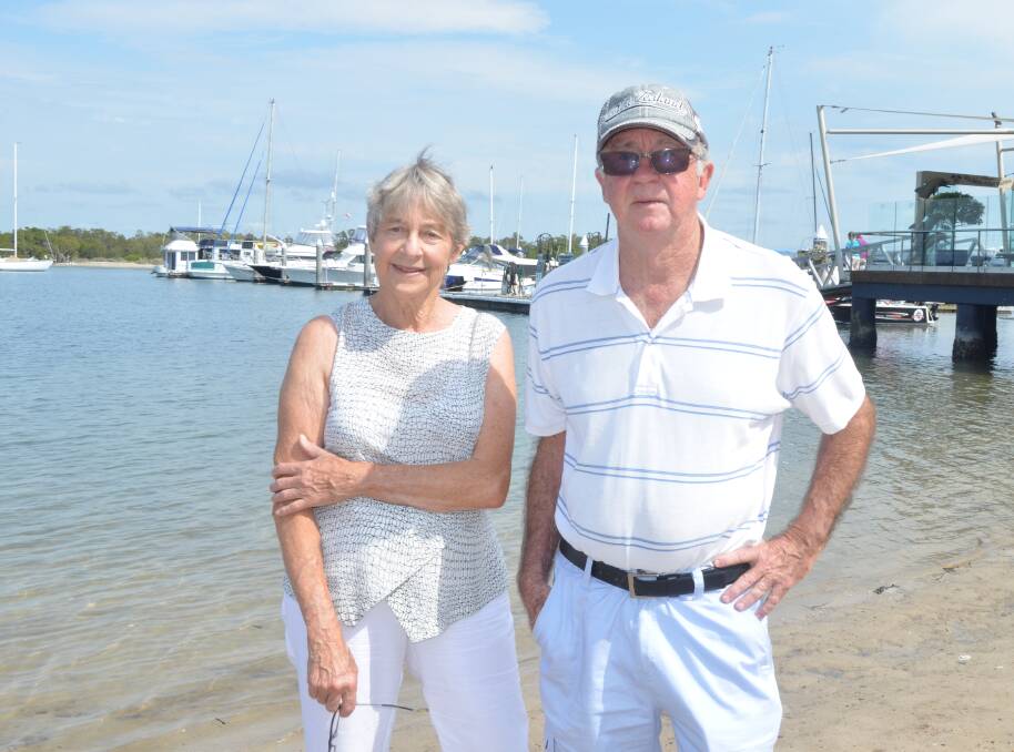 SMALL VICTORY: Soldiers Point Community Group president Jean Armstrong and vice-president Peter Maloney outside Soldiers Point Marina. Picture: Sam Norris