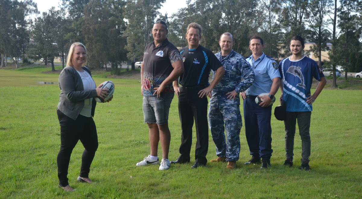 TEAMWORK: Representatives from the upcoming Port Stephens NAIDOC Touch Football Championship. They are, Cindy Turner (Port Stephens Council), Brooke Roach (Worimi), Ivan Cole (RAAF), Jeff Gilewski (RAAF), Mick Fortier (police) and Brady Ridgeway (Worimi). Picture: Sam Norris
