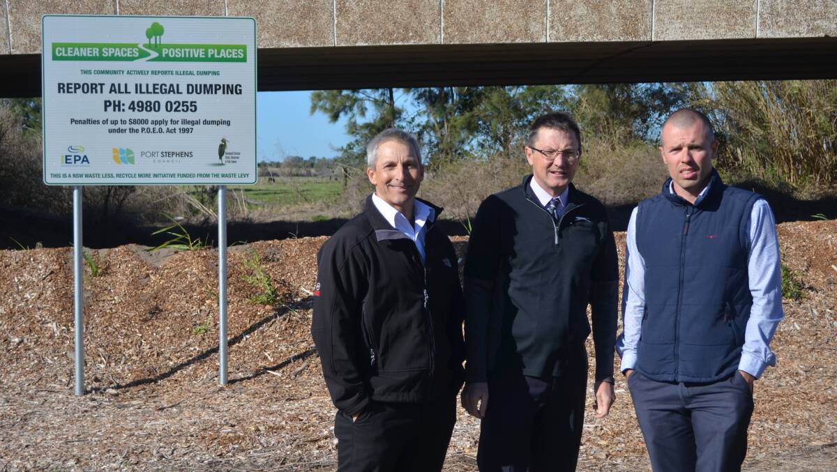 DETERRENCE MEASURES: Port Stephens Council general manager Wayne Wallis, Parliamentary Secretary for the Hunter Scot MacDonald and council environmental health and compliance coordinator Marc Goodall.