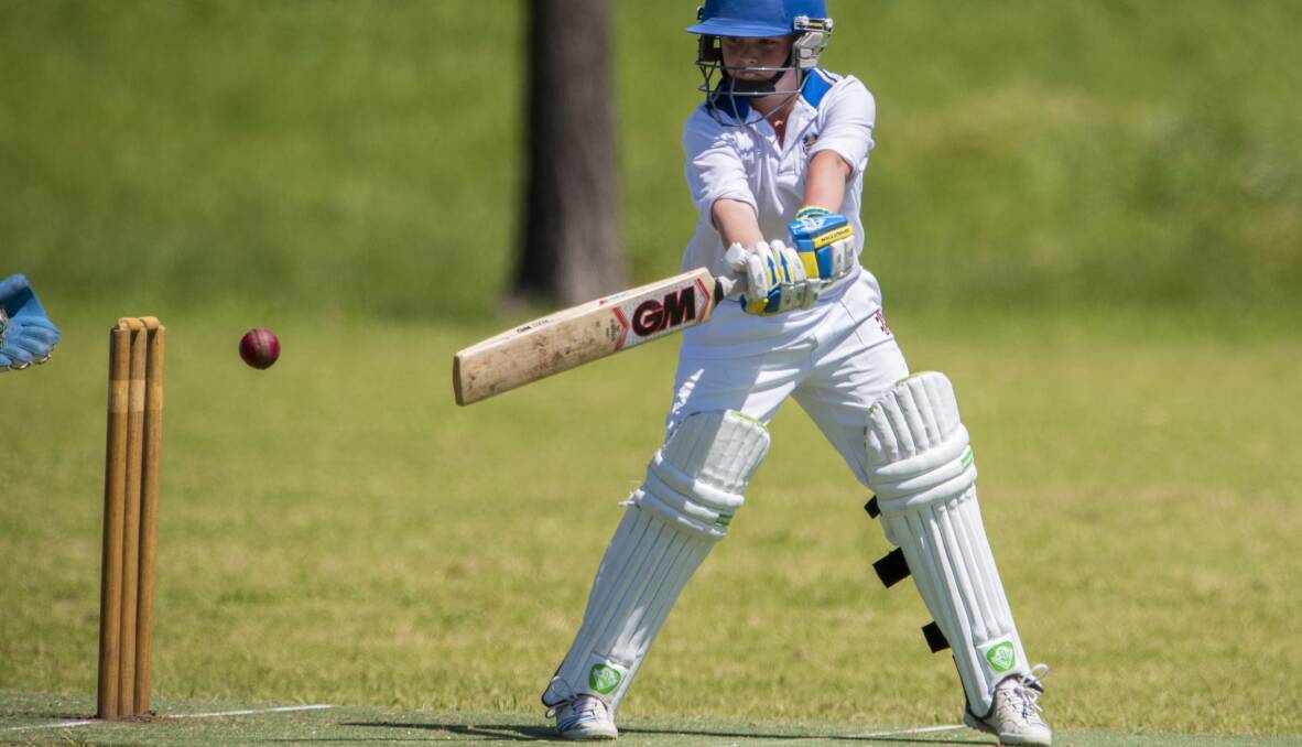 ON SONG: Raymond Terrace junior Baylee Borrow cuts for the boundary in his unbeaten innings for the Under 14s Hunter Valley representative team. Picture: Peter Haddin