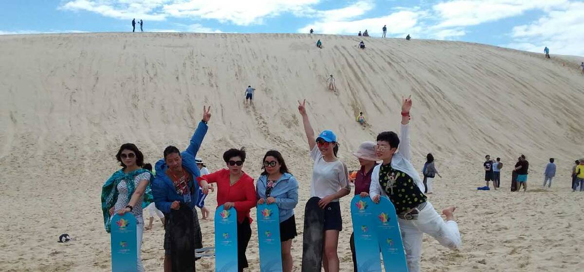 HANG TEN: Amway delegates from China have been rewarded with a trip to Port Stephens. Tourism operators have flocked to welcome them. Picture: Supplied 