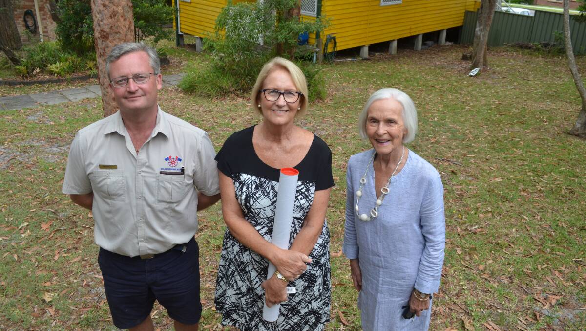 SUPPORT: Soldiers Point Marina manager Darrell Barnett, Yacaaba Centre general manager Lynn Vatner and Nelson Bay Rotary president Judy Mitchell await construction of three one-bedroom units at Nelson Bay. 