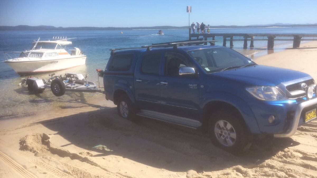 BUGGER: Bogged on the boatramp. Noel Toms agrees with John "Stinker" Clarke, when he says fishers and boaties have had enough of the Little Beach boat ramp.