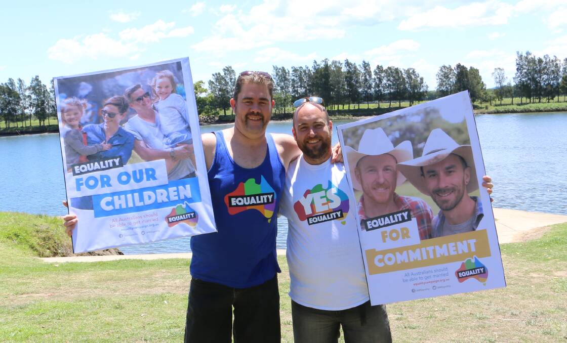 RELIEVED: Chris Baguley and good friend Aaron Churchill, both of Raymond Terrace, after the polls returned a 'yes' vote on Wednesday. Picture: Sam Norris