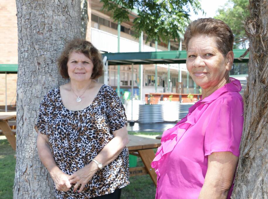 REUNITED IN GRIEF: Judy West and Margo Beavan will share their stolen generation story at the Hunter River High School on Thursday. Picture: Stephen Wark