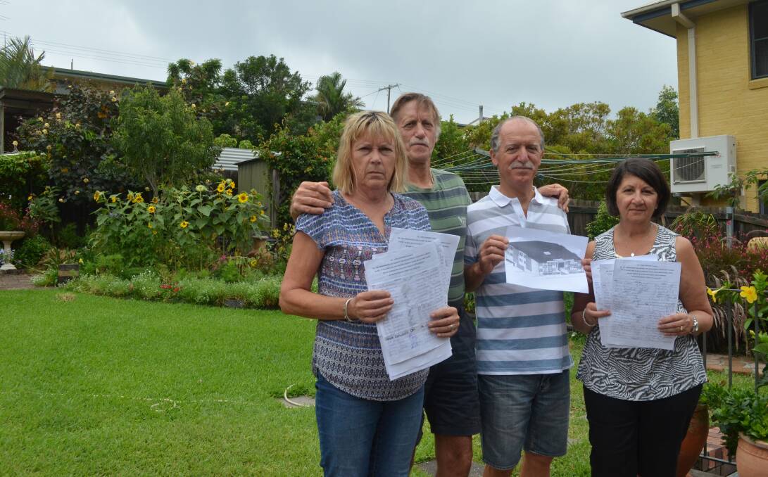 STUNNED: Marilyn and Russel Williams with neighbours Tony and Angela Athas. They're opposed to plans for 10 units proposed on their back boundary - six of them with balconies overlooking their homes. Picture: Sam Norris