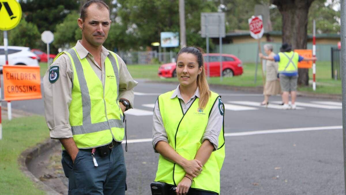 LAW ENFORCERS: Port Stephens Council rangers Luke Kearney and Kirsty Simiana, now targeting parking in school zones. Picture: Sam Norris