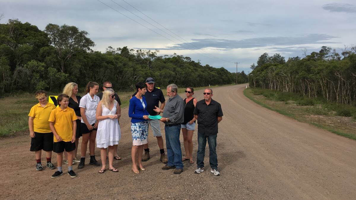 SLOW DOWN: Port Stephens MP Kate Washington meets with Swan Bay residents. She said Port Stephens should fix its own roads before seeking a Dungog merger. Picture: Supplied