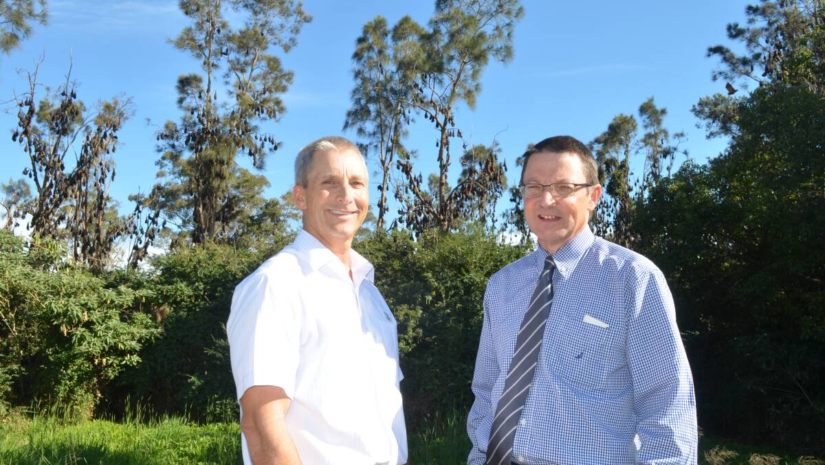 HELP NEEDED: Port Stephens Council general manager Wayne Wallis meets with Parliamentary Secretary for the Hunter Scot MacDonald MLC at Newbury Park to talk bats. Picture: Sam Norris