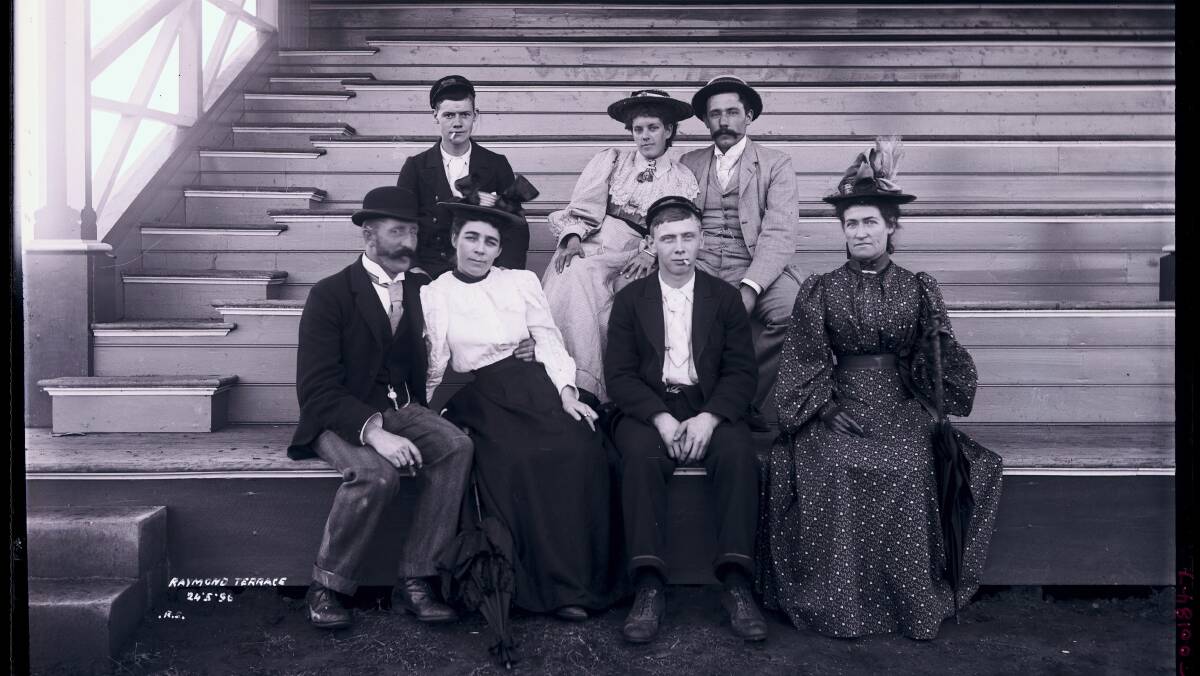 BYGONE ERA: An unknown group sits in the old Pavilion at Boomerang Park in 1896. Sourced from the Ralph Snowball Collection at Newcastle Region Library.