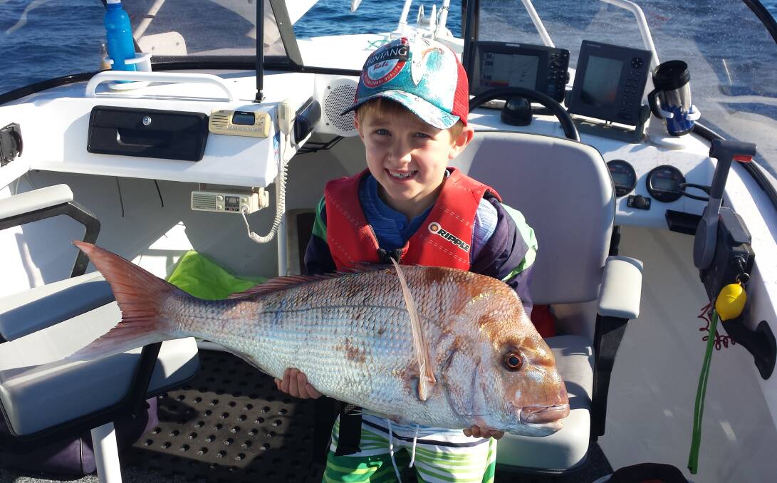 EPIC: Thomas O'Toole, 7, with his 6kg snapper, which he hooked north of Broughton Island. 