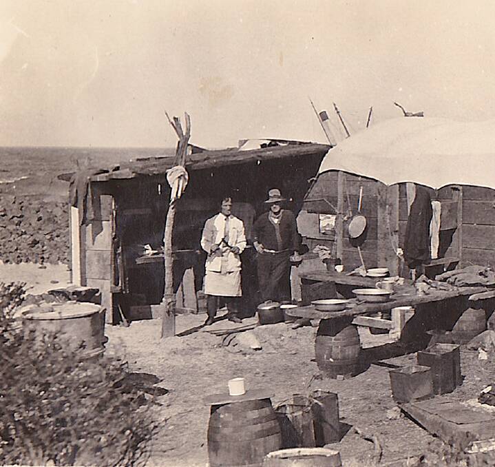 COVE DWELLERS: The salvage crew camp 1929 with the Grit Hole in the background.