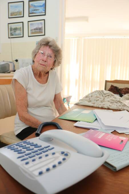 DISCONNECT: Anne Fordham, 91, has been waiting six weeks for Telstra to reconnect the landline phone service at her Dora Creek home. Picture: David Stewart