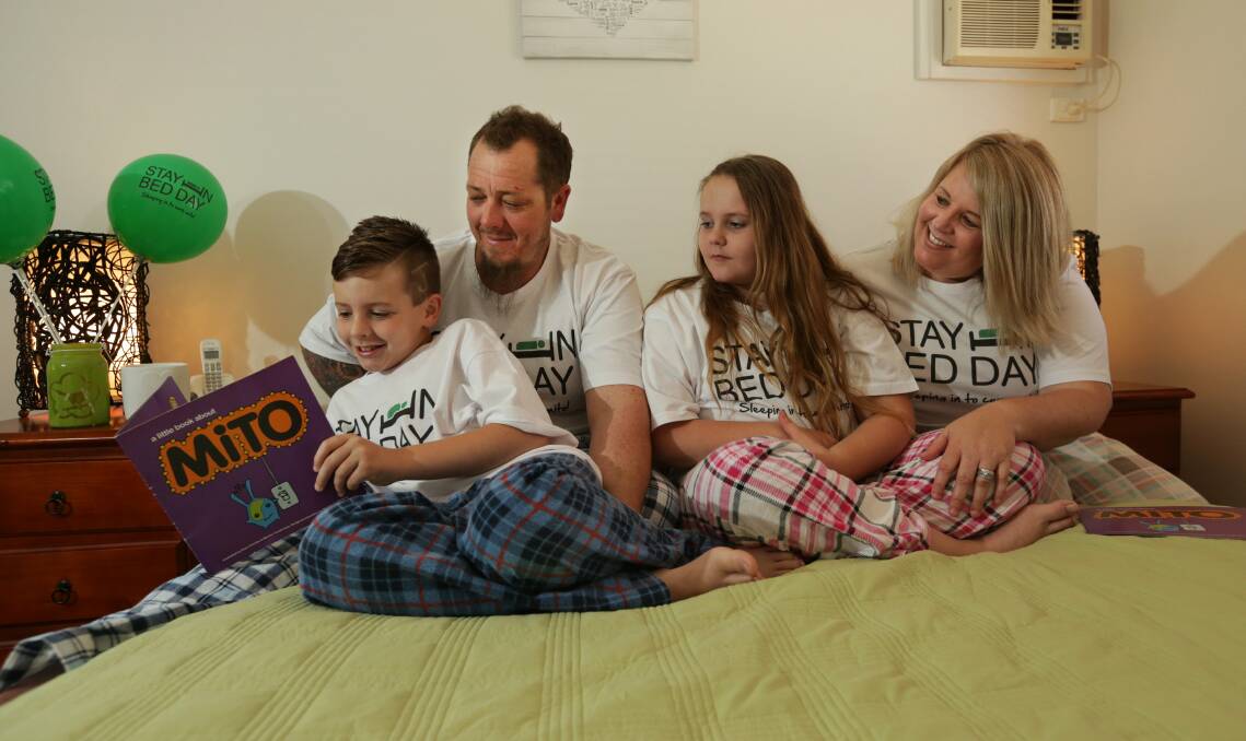 Never forget: Jayden, Michael, Savannah and Renae Meyers will don their pajamas for Stay in Bed Day on Sunday. Mrs Meyers' workmates at Coles Cessnock are also raising funds to find a cure. Picture: Fairfax Media