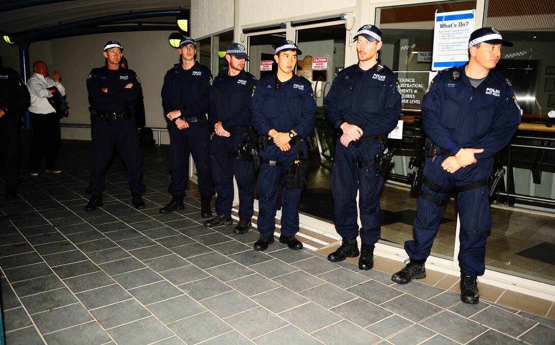 ON GUARD: Police line Cessnock council chambers after the controversial Buchanan mosque was sensationally approved. Picture: Sage Swinton  