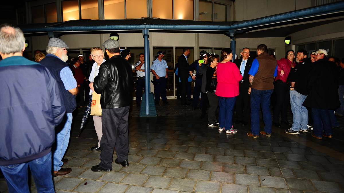 Supporters and opponents to the Buchanan mosque gather outside the Cessnock council chambers on Wednesday night. Picture: Sage Swinton