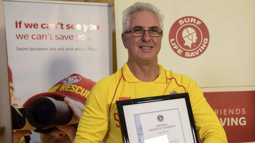 Cooks Hill SLSC director of lifesaving Mark Doherty accepting the National Rescue of the Month Award. Picture: Surf Life Saving Australia.