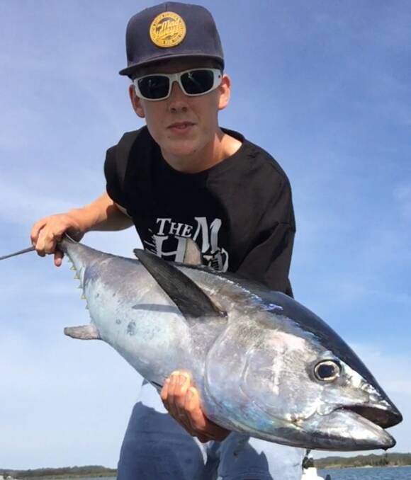GREAT CATCH: Local champ Jack Hammond with his 23-kilogram longtail tuna that he caught in Salamander Bay.  