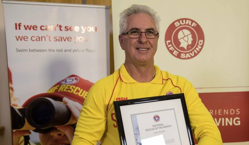 Cooks Hill SLSC director of lifesaving Mark Doherty accepting the National Rescue of the Month Award. Picture: Surf Life Saving Australia