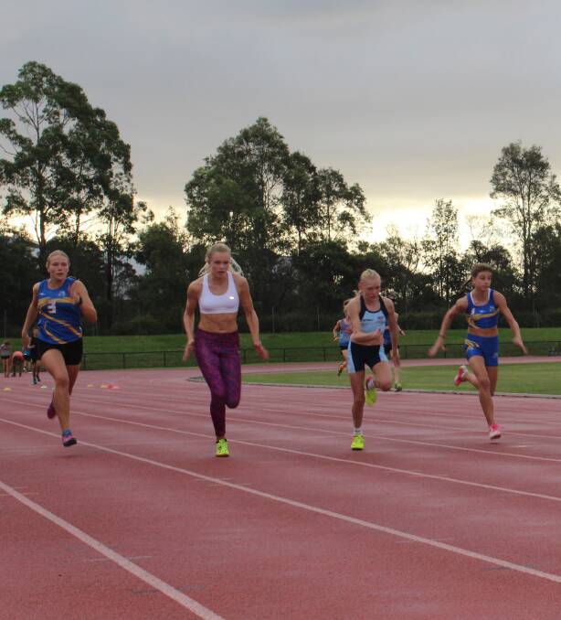 FLEET OF FOOT: Jacy Carter, left, trains with friend Grace Hewitt, second from left, ahead of the NSW LIttle Athletics Championships at Homebush from Friday.