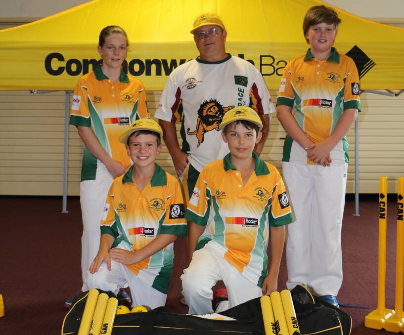 BOOST: Raymond Terrace Cricket Club members Sarah, 15, Dave Farmer, Elias, 13, Ryley, 11 and Daniel,12. Photo: Kia Woodmore