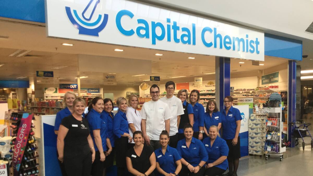 Community spirit: Owner and Pharmacist in charge Tim Mizzi (centre) with his highly valued team.